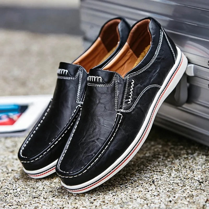 Brown slip-on leather loafers for men, showcasing comfort and sophisticated men's fashion.