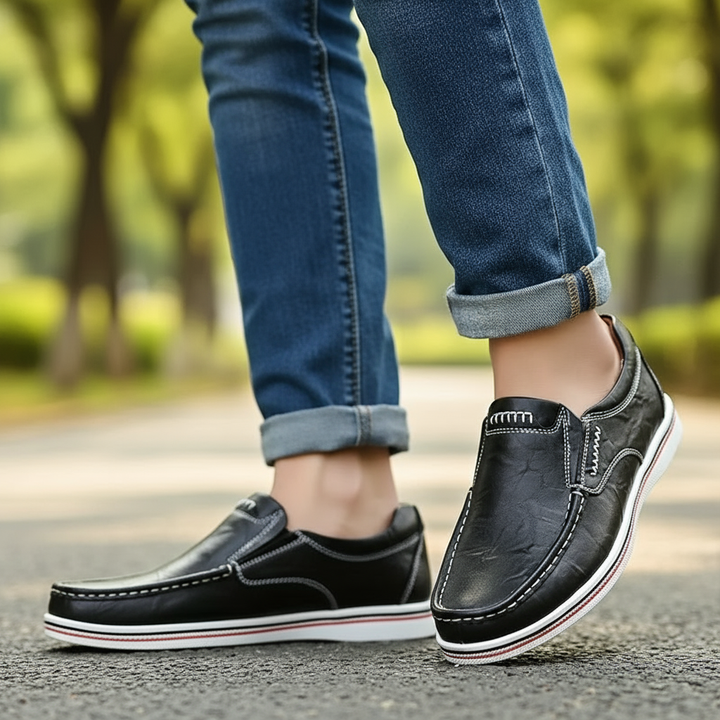 Polished burgundy men's dress loafers, made from high-quality leather for a luxurious feel.