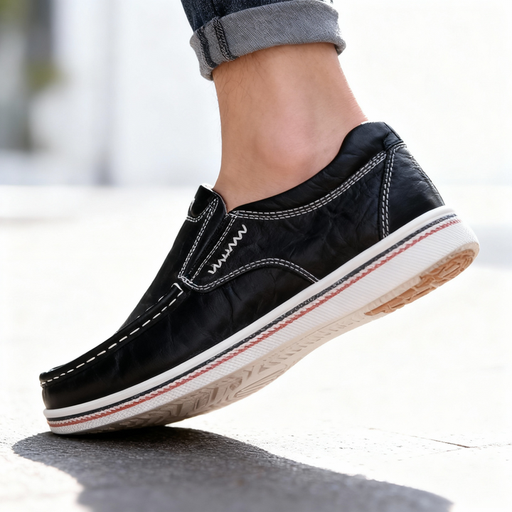 Detail of the sole on men's luxury leather loafers, showing durable and comfortable footwear.