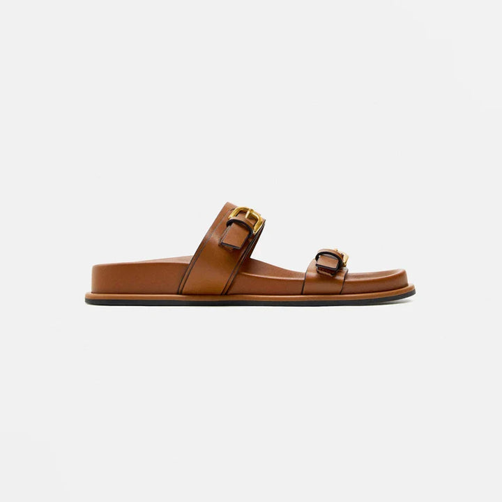 Stylish men's black leather slides with an adjustable buckle, ideal for summer