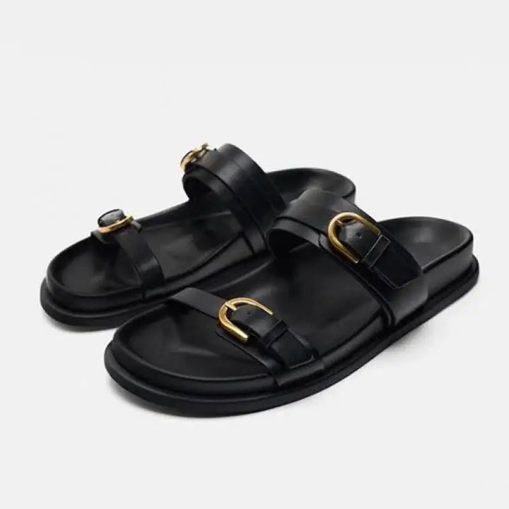 Men's leather slide sandals, side angle, showcasing ergonomic design and sole