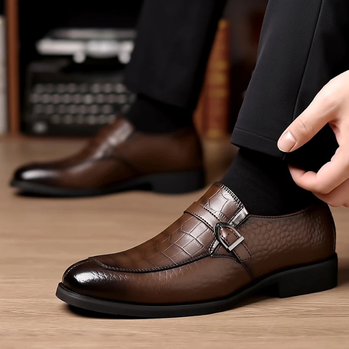 Underside view of men's leather monk strap loafers, showing the durable sole and quality construction.