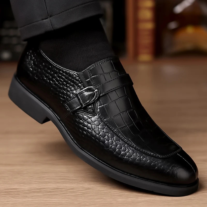 Stylish men's black leather monk strap shoes, a blend of classic design and modern crocodile texture.