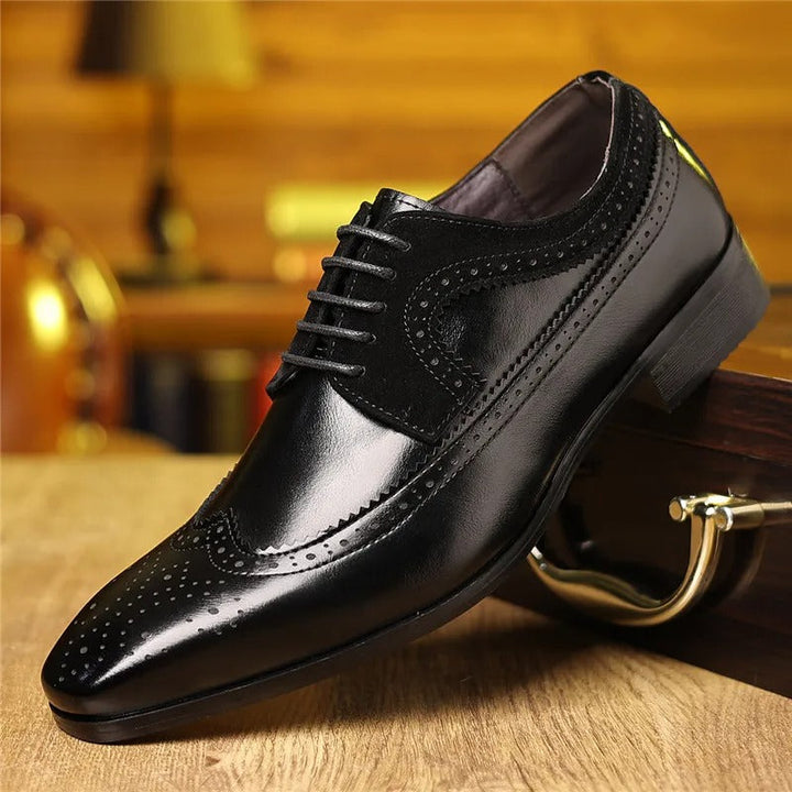 Pair of rich oxblood men's luxury brogue Oxford shoes, a smart choice for any men's fashion ensemble.