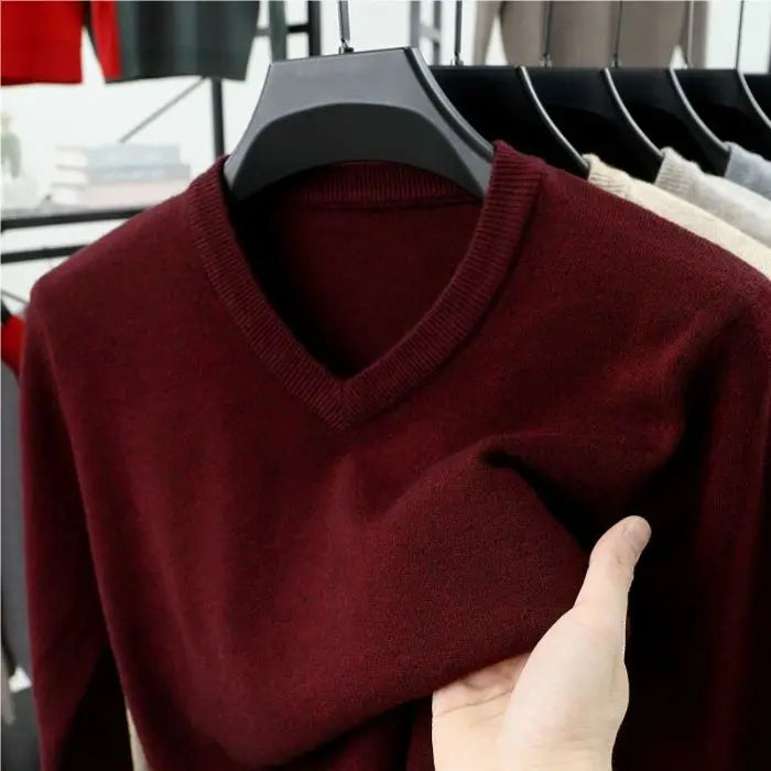 Versatile men's V-neck sweater, cashmere-blend fabric offering warmth and comfort, a key piece for men's apparel.
