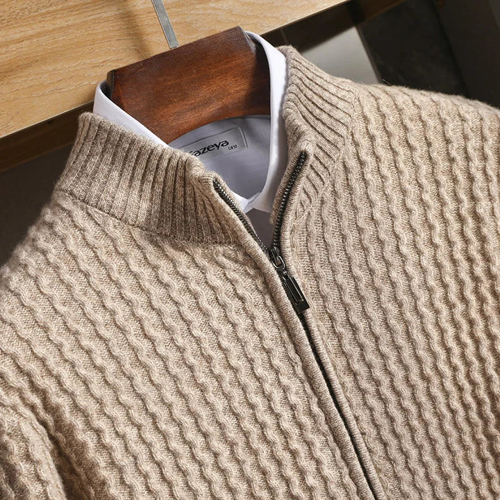 Close-up of textured men's cashmere half-zip sweater, highlighting the soft knitwear quality.