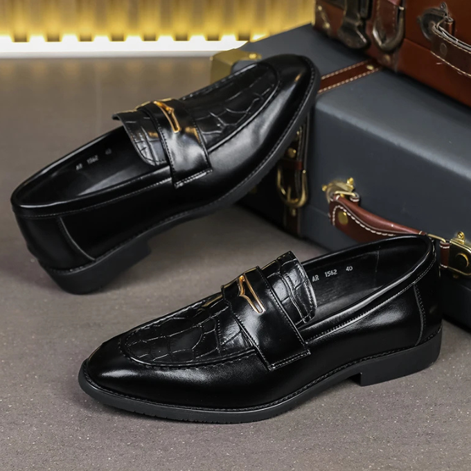 Pair of men's formal croc-embossed leather loafers, emphasizing quality and design
