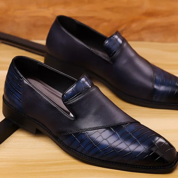 Sophisticated men's footwear: croc-textured dress loafers in classic black