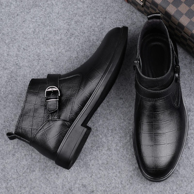 Luxurious black full-grain leather ankle boots for men, offering superior comfort and style.