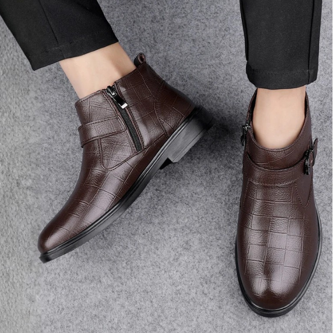 Side view of men's brown full-grain leather ankle boots, highlighting the quality craftsmanship.