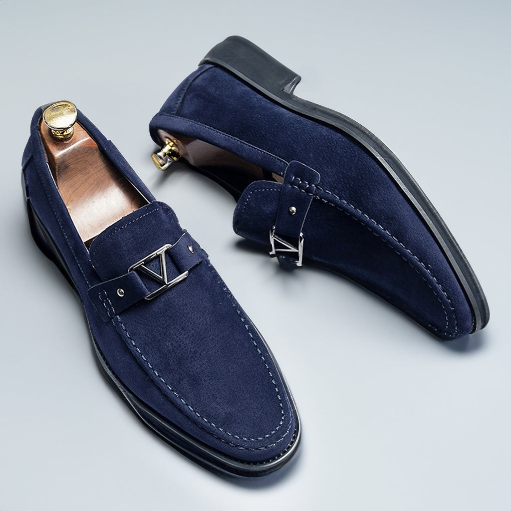 Stylish men's slip-on dress shoes: vegan suede loafers with a refined buckle accent.