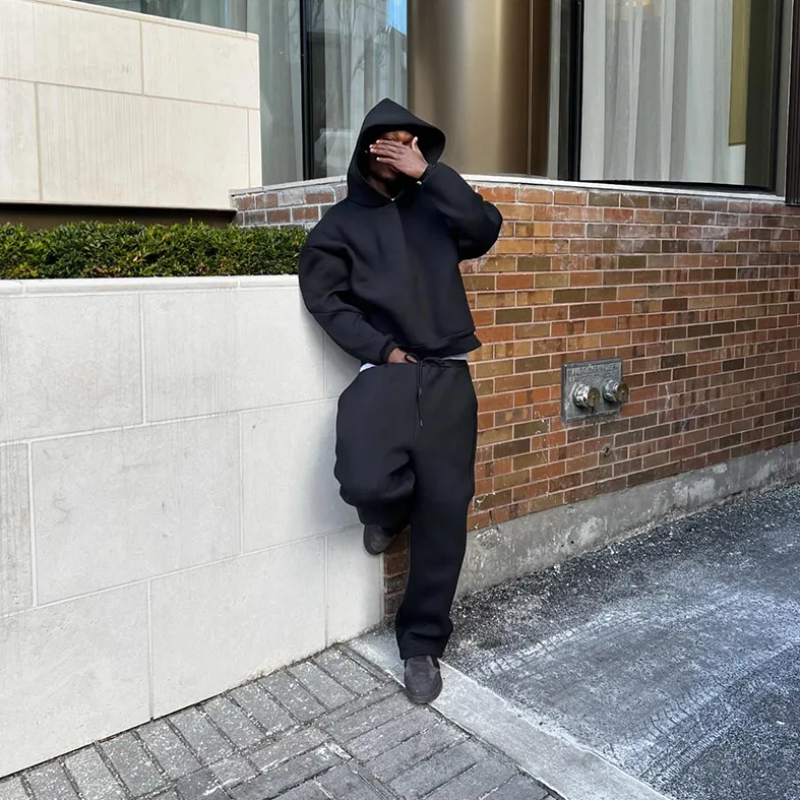 Stylish two-piece men's activewear set: hooded sweatshirt and matching sweatpants