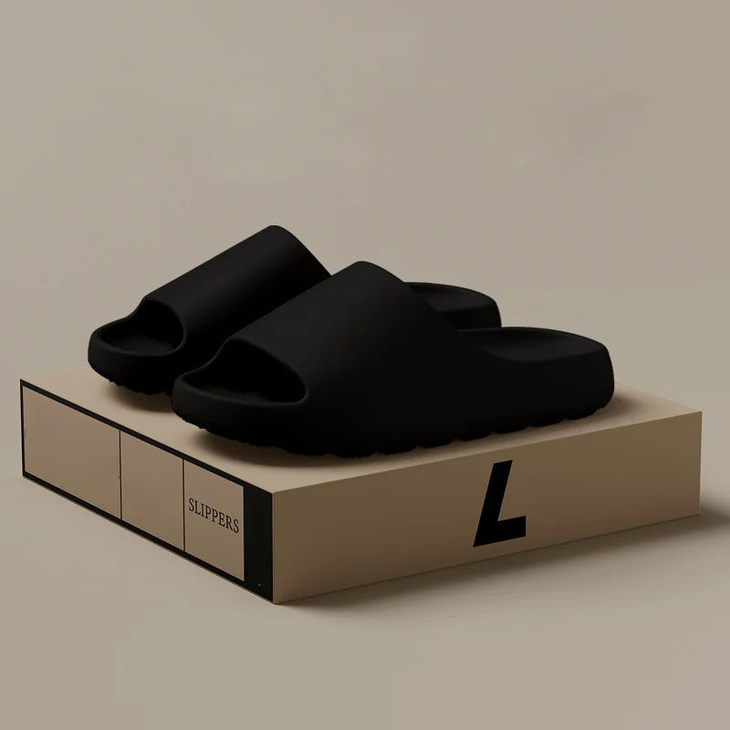 Comfortable men's slide slippers with an open toe design for indoor and outdoor use in spring, top view.