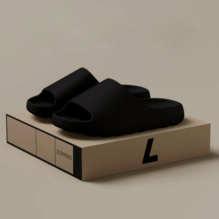 Comfortable men's slide slippers with an open toe design for indoor and outdoor use in spring, top view.