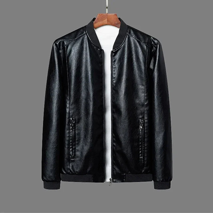 Close-up of a men's leather bomber jacket, showcasing the quality leather and zip detail.