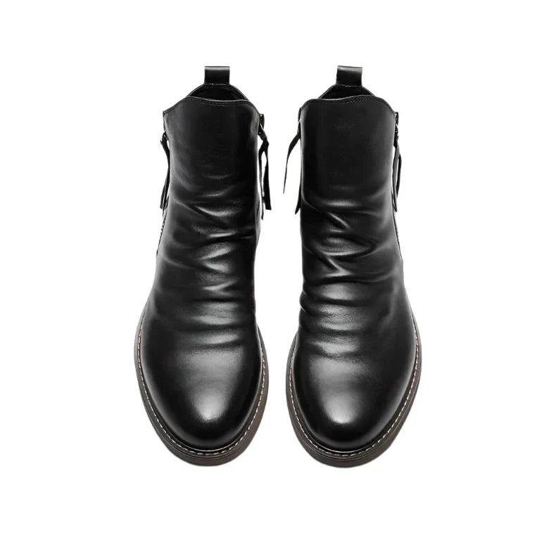 Polished leather Chelsea boots for men, featuring elastic side panels, ideal for versatile footwear.