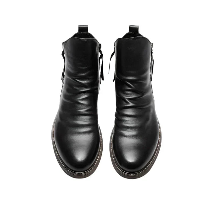 Polished leather Chelsea boots for men, featuring elastic side panels, ideal for versatile footwear.