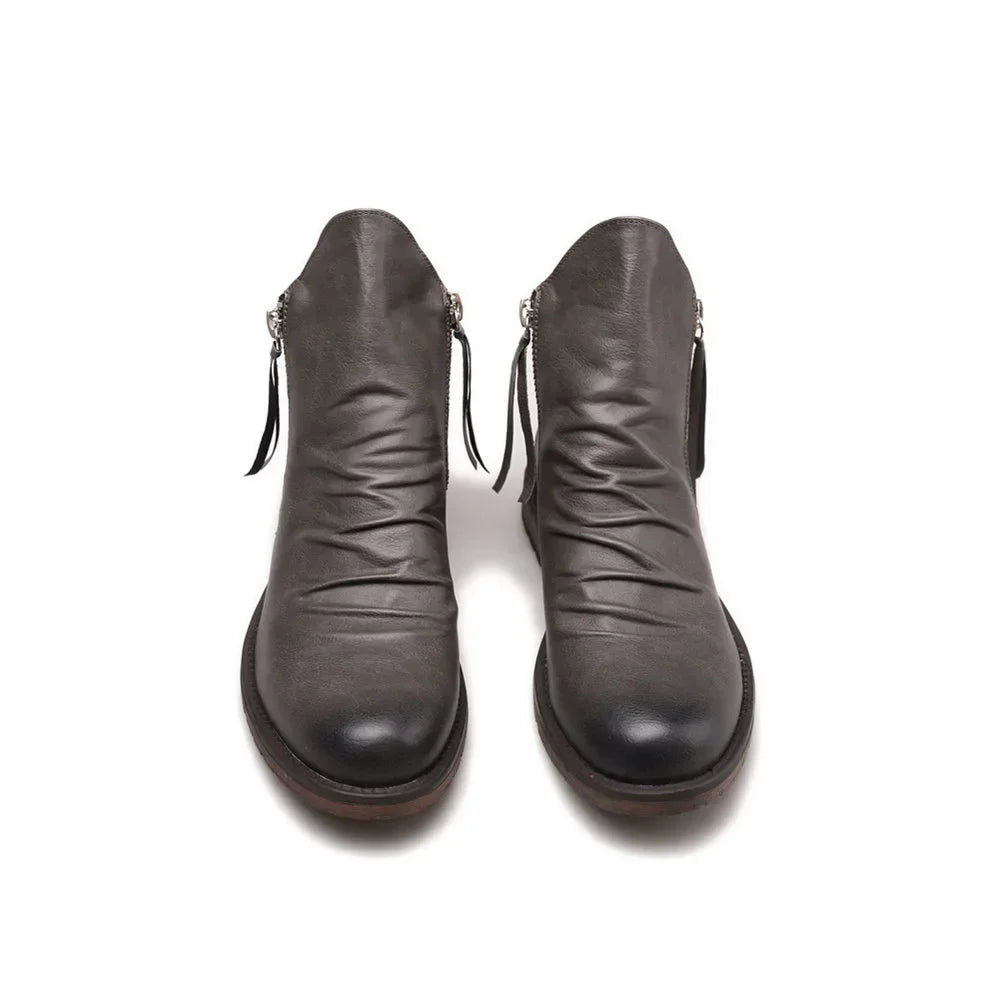 Dress-casual men's footwear: sophisticated leather Chelsea boots with a contemporary design.