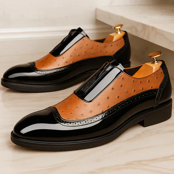 Modern men's brown Oxford dress shoes, showcasing stylish side zip. Elegant & comfortable formal footwear.