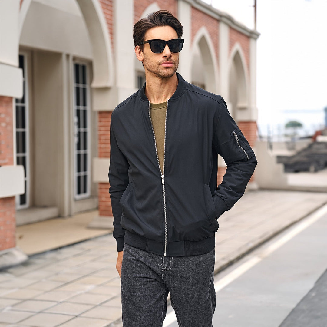 Close-up of zipper on men's bomber jacket, smooth operation, high-quality hardware detail