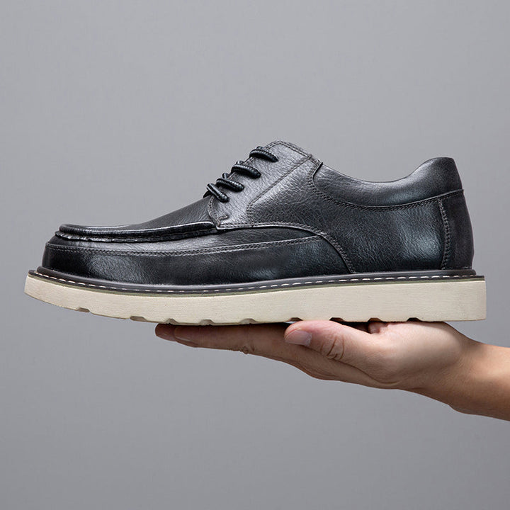 Men's grey casual boots in motion, suggesting comfort and ease of movement for wearers