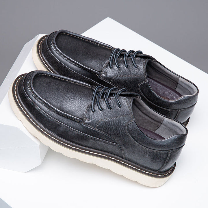 Close-up of the laces on men's brown casual boots, a classic and secure footwear detail