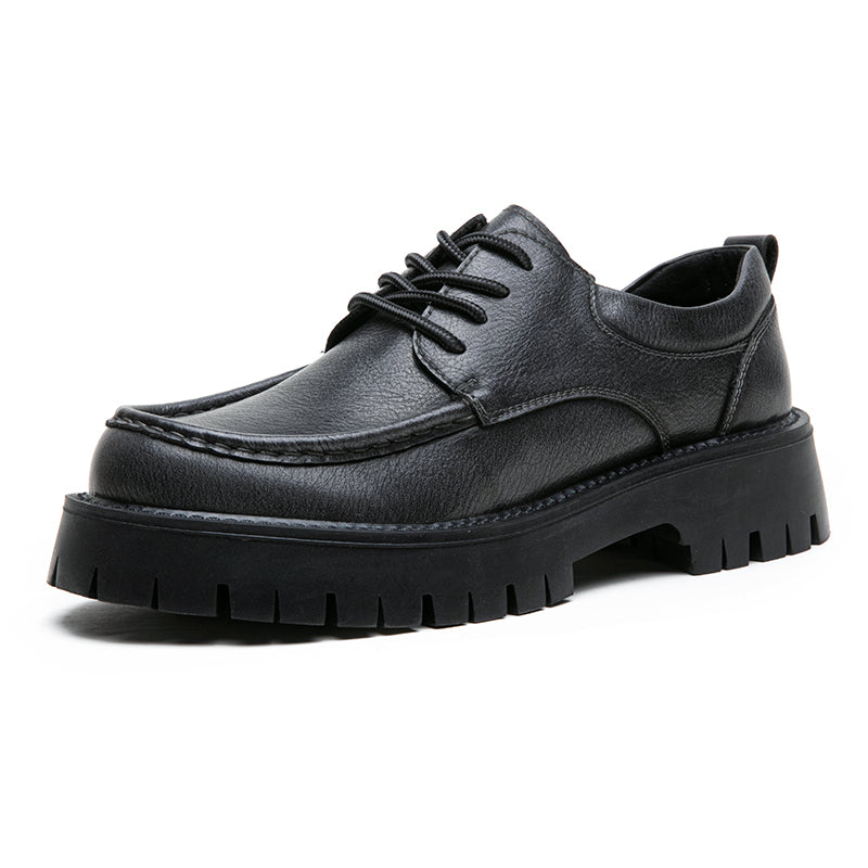 Overhead shot of men's brown casual boots, emphasizing their sleek and modern design