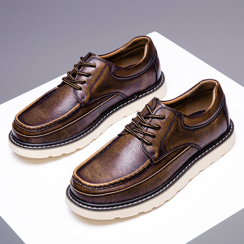 Side view of men's grey casual boots, highlighting the comfortable sole and ankle support