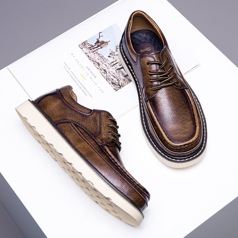Pair of men's modern casual brown boots, ideal for smart and relaxed outfits