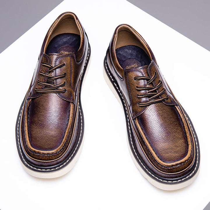 Top-down view of men's grey casual boots, showcasing their comfortable and versatile design