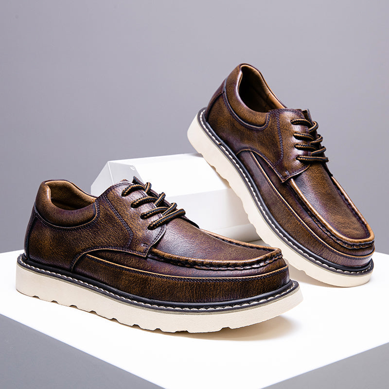 Men's brown casual boots with a distressed leather finish, adding a rugged yet stylish look