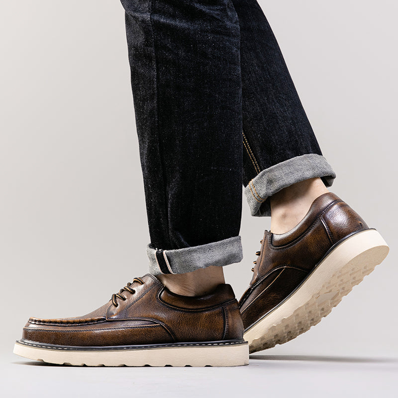 Detail of the comfortable inner lining of men's modern casual brown boots, soft footwear