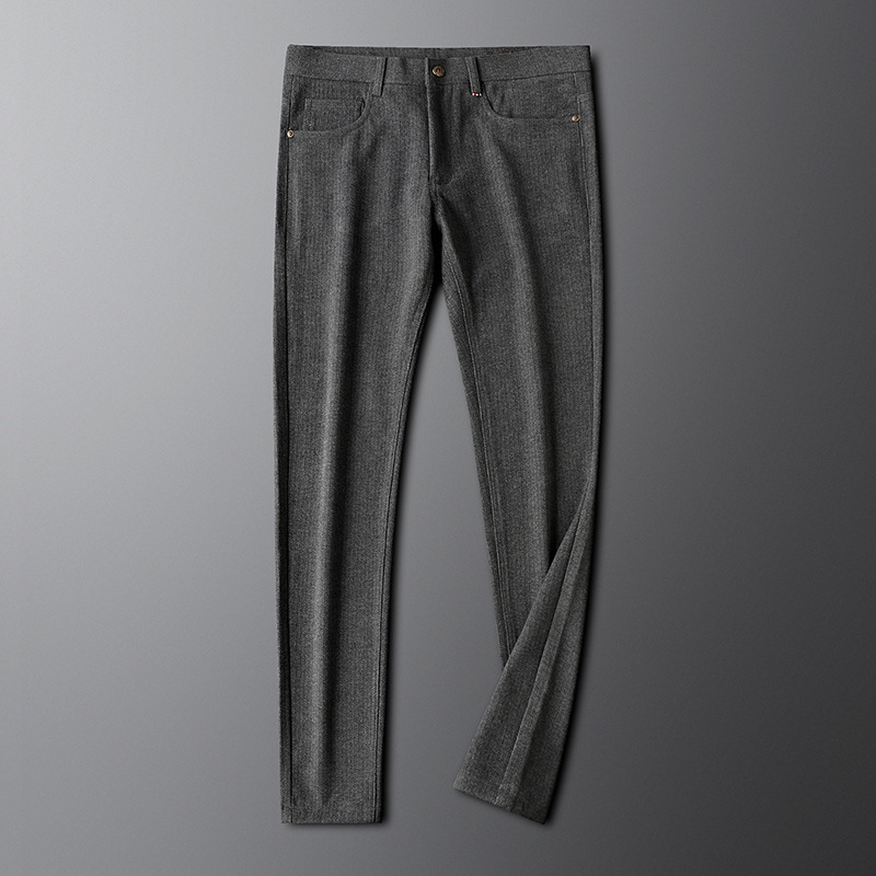 Full shot of gray men's tailored trousers, showcasing a modern fit suitable for office wear and events.