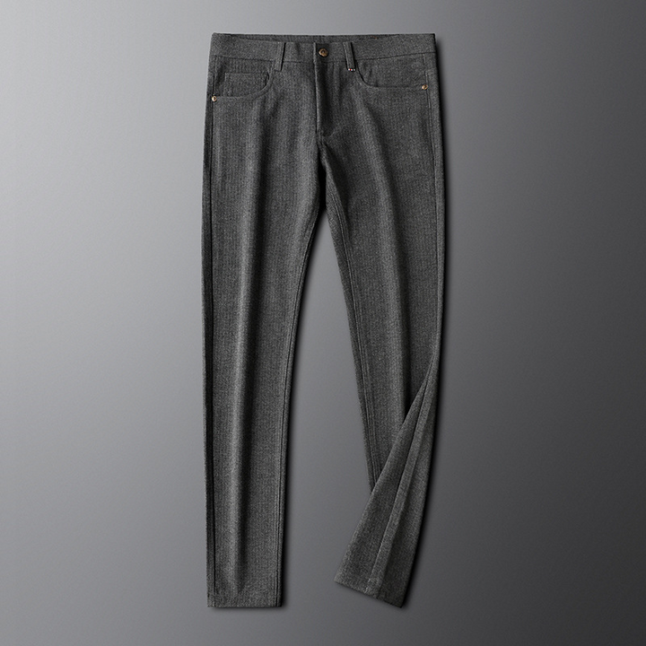 Full shot of gray men's tailored trousers, showcasing a modern fit suitable for office wear and events.
