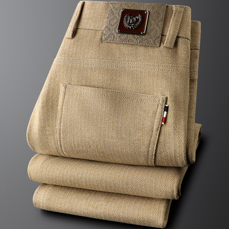 Versatile men's gray tailored trousers, designed for professional office wear or elevated smart casual outfits.