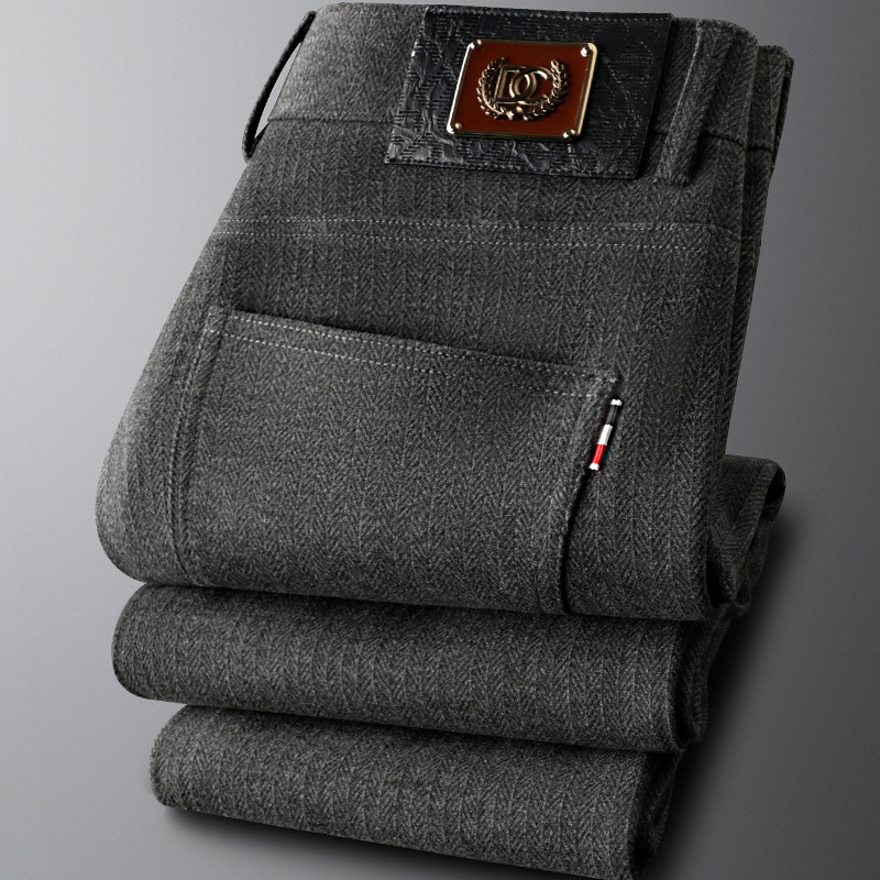 Khaki men's tailored trousers laid flat, displaying the clean lines and refined cut perfect for any occasion.