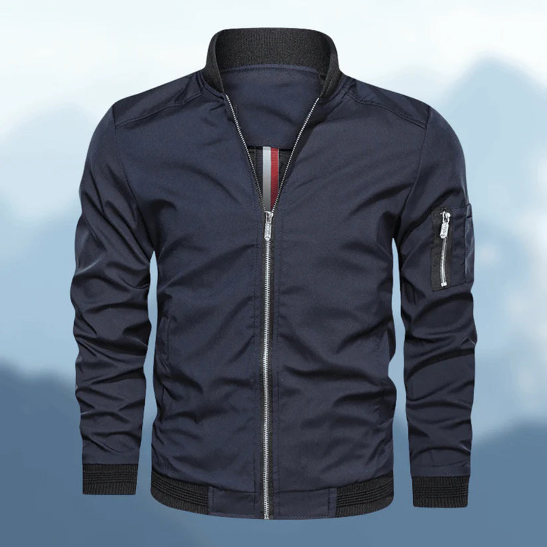 Stylish men's bomber jacket, slim fit, black with ribbed cuffs and collar, side pose