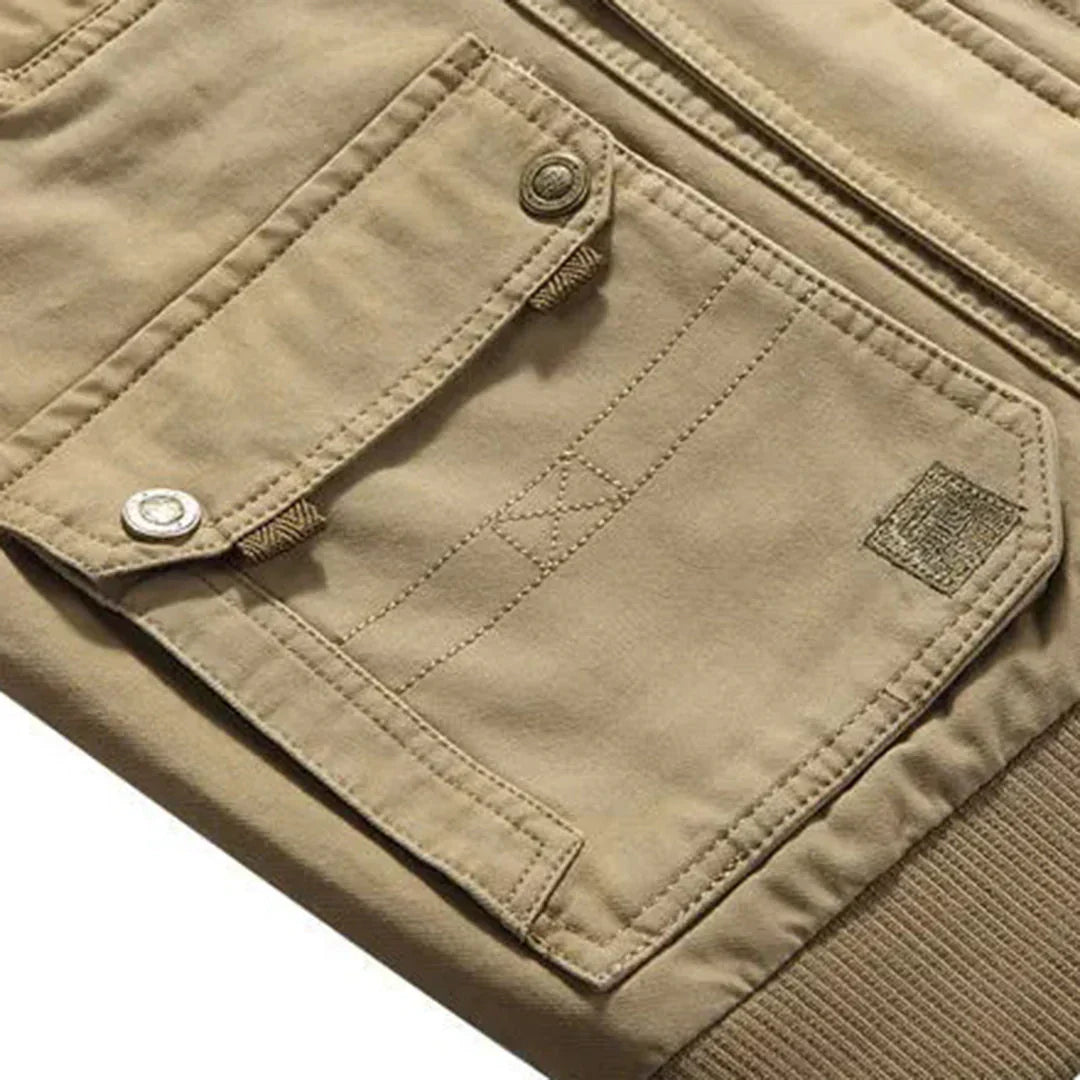 Rugged men's multi-pocket utility vest. Ideal sleeveless casual vest for hiking, travel, and outdoor activities.
