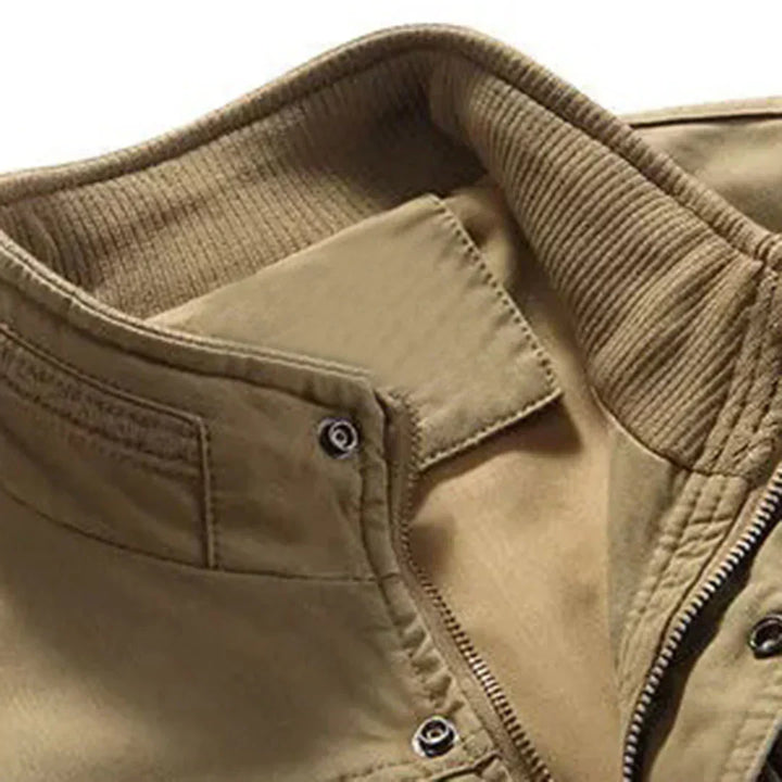 Sleeveless men's multi-pocket vest. Practical utility vest for hiking, fishing, and travel. Khaki & green options.