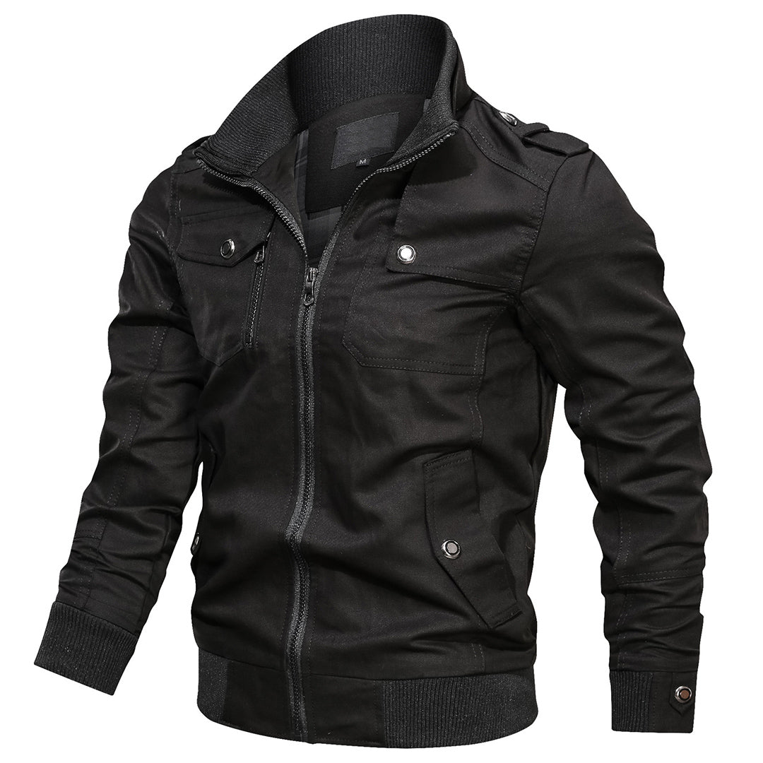 Close-up of multi-pocket detail on a men's tactical bomber jacket, showing functionality