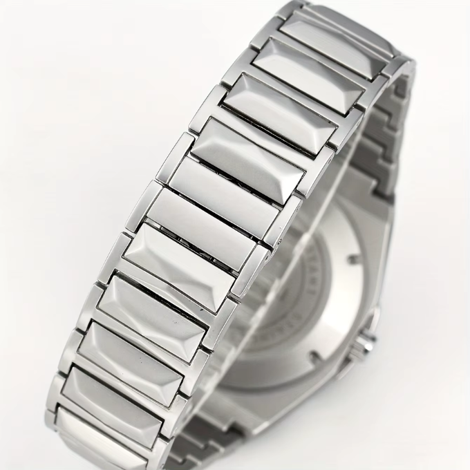 Side view of a men's octagonal stainless steel timepiece, highlighting its geometric case