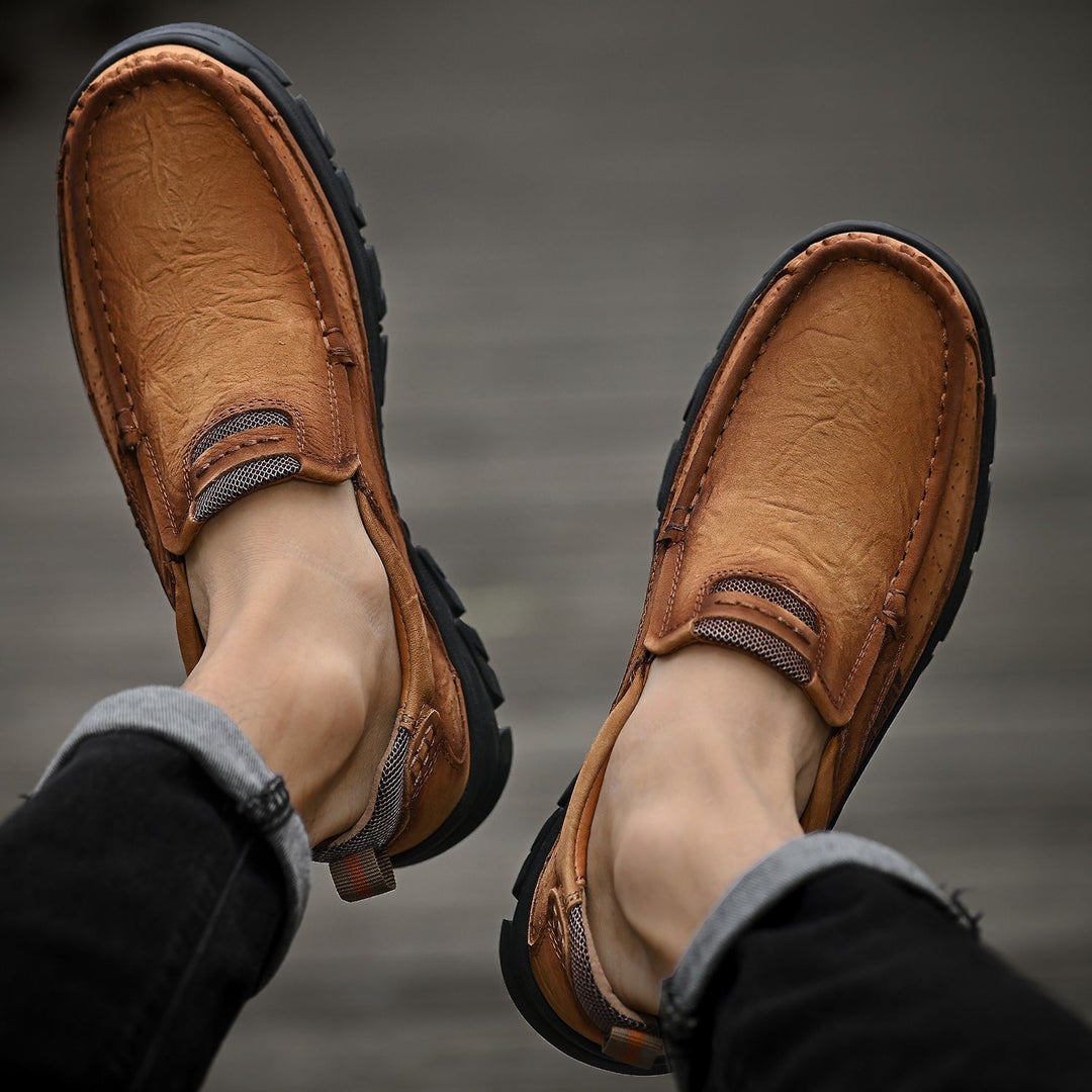 Side profile of khaki orthopedic men's boots, comfortable design for walking, posture correction.