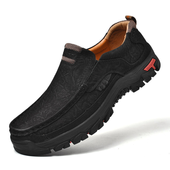 Black orthopedic men's boots, comfortable and stylish, perfect for a modern men's wardrobe.