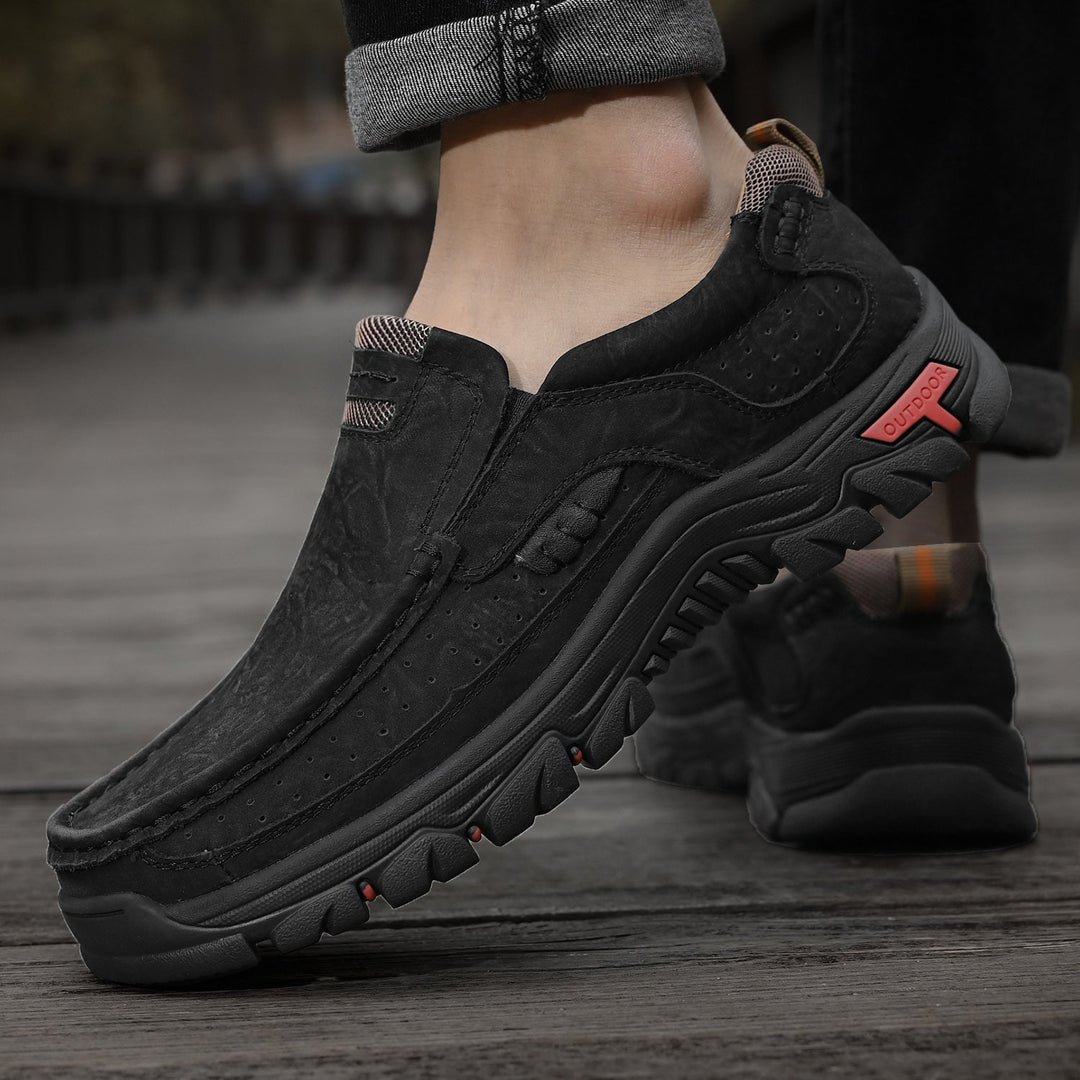 Black orthopedic men's boots, comfortable, featuring a clean, minimalist design for versatile wear.