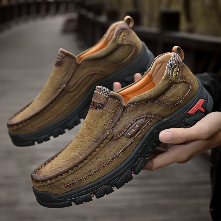 Black orthopedic men's boots, comfortable, showcasing a seamless blend of function and fashion.