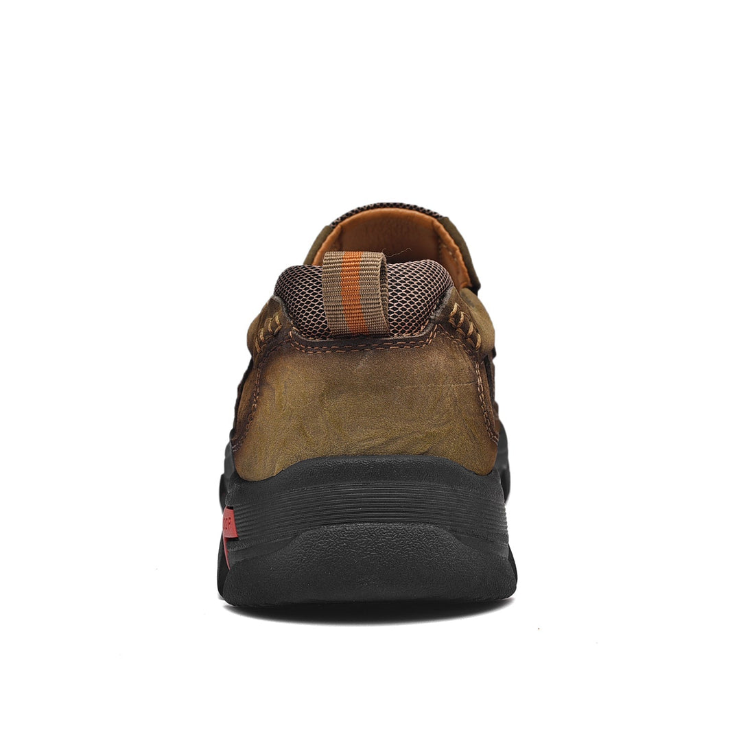 Men's brown orthopedic boots, comfortable, with emphasis on the flexible and supportive sole.