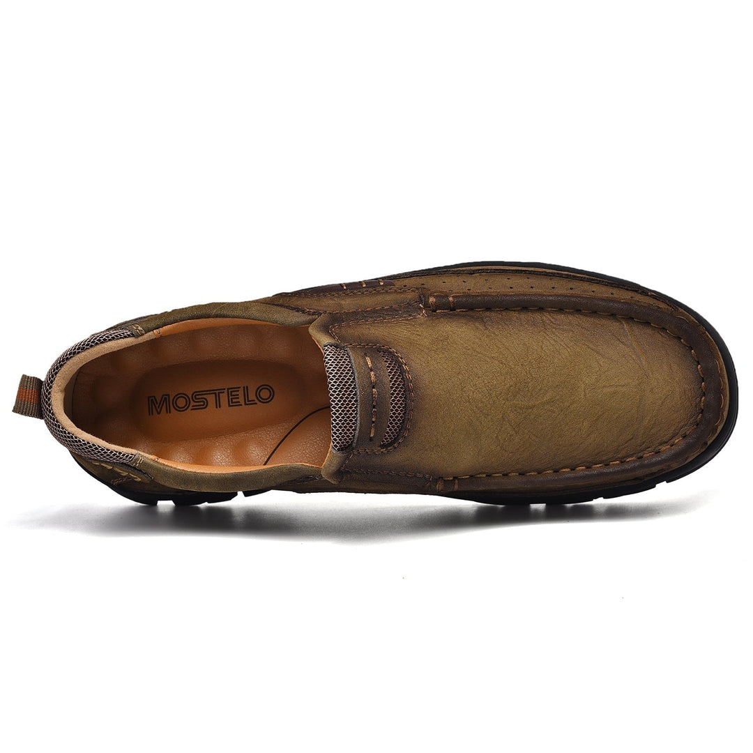 Black orthopedic men's boots, comfortable, presenting a sleek silhouette for sophisticated men.