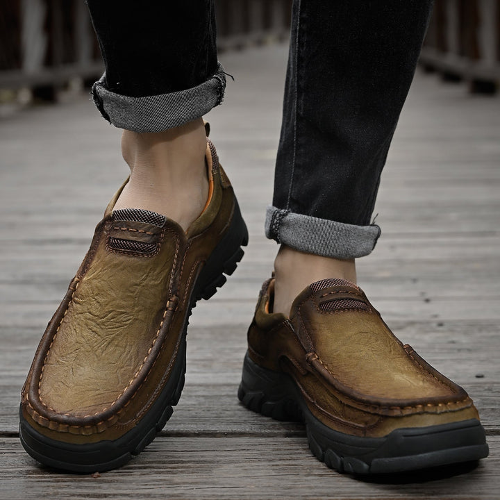 Black orthopedic men's boots, comfortable, designed with an ergonomic fit for ultimate comfort.
