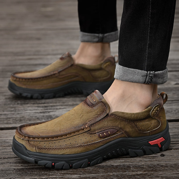 Black orthopedic men's boots, comfortable, with dynamic support for active lifestyles.