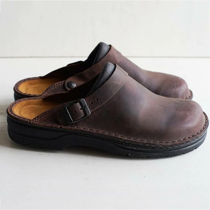 Men's orthopedic comfort clogs, black, providing all-day support & arch relief for everyday wear.
